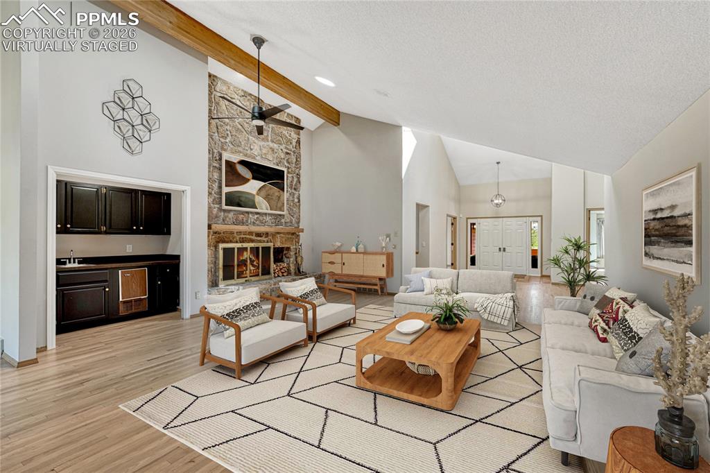 3120 Camels Ridge Lane Colorado Springs, CO 80904 - Photo 5 of 50 "Virtually Staged" Vaulted with Wood Beam, Hardwood Floors, Wet Bar