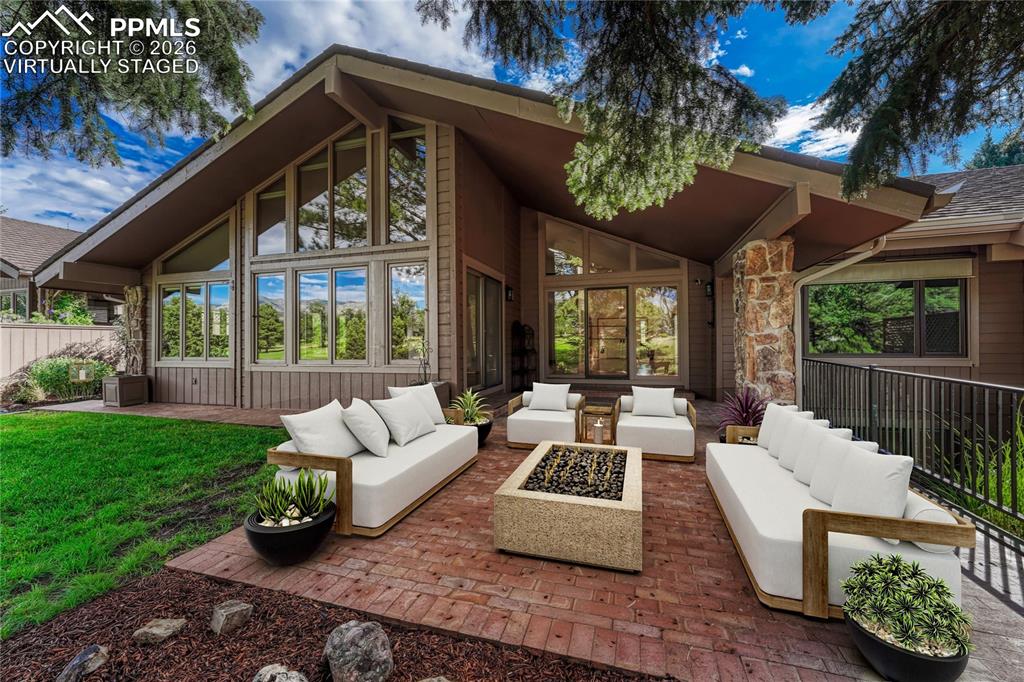 3120 Camels Ridge Lane Colorado Springs, CO 80904 - Photo 7 of 50 "Virtually Staged", Large Partially Covered Paver Patio with Views.