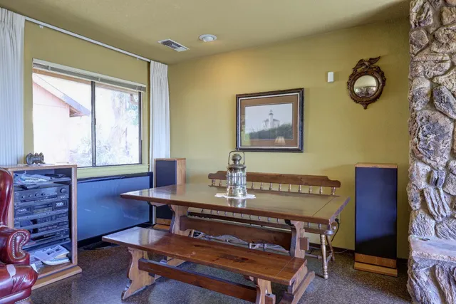 a workspace with furniture and window