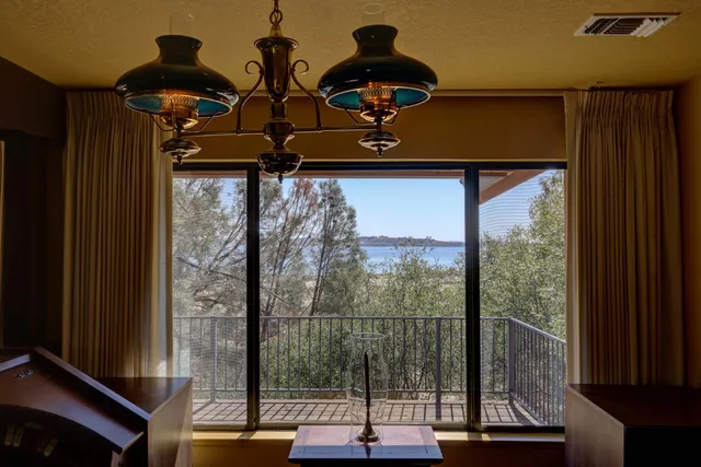 a view of a balcony with a potted plant