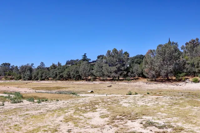 a view of a beach with a ocean view