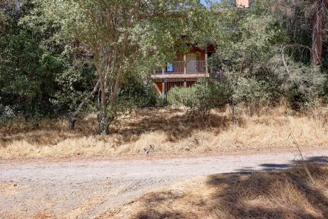 a view of a road with an ocean view