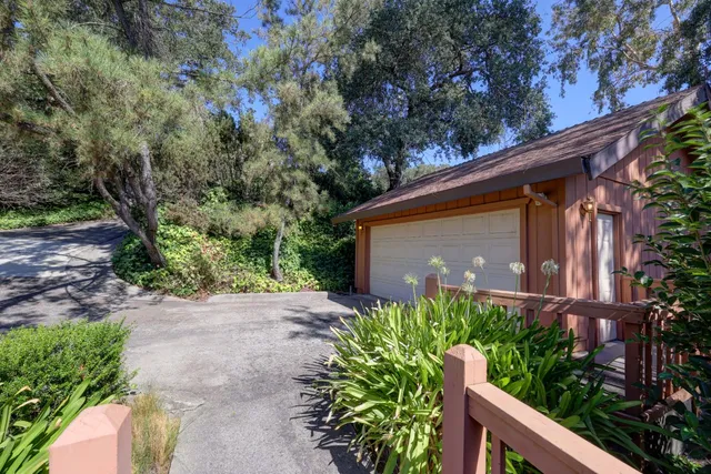 a backyard of a house with lots of green space