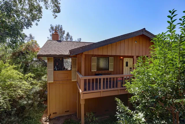 a view of a house with roof deck