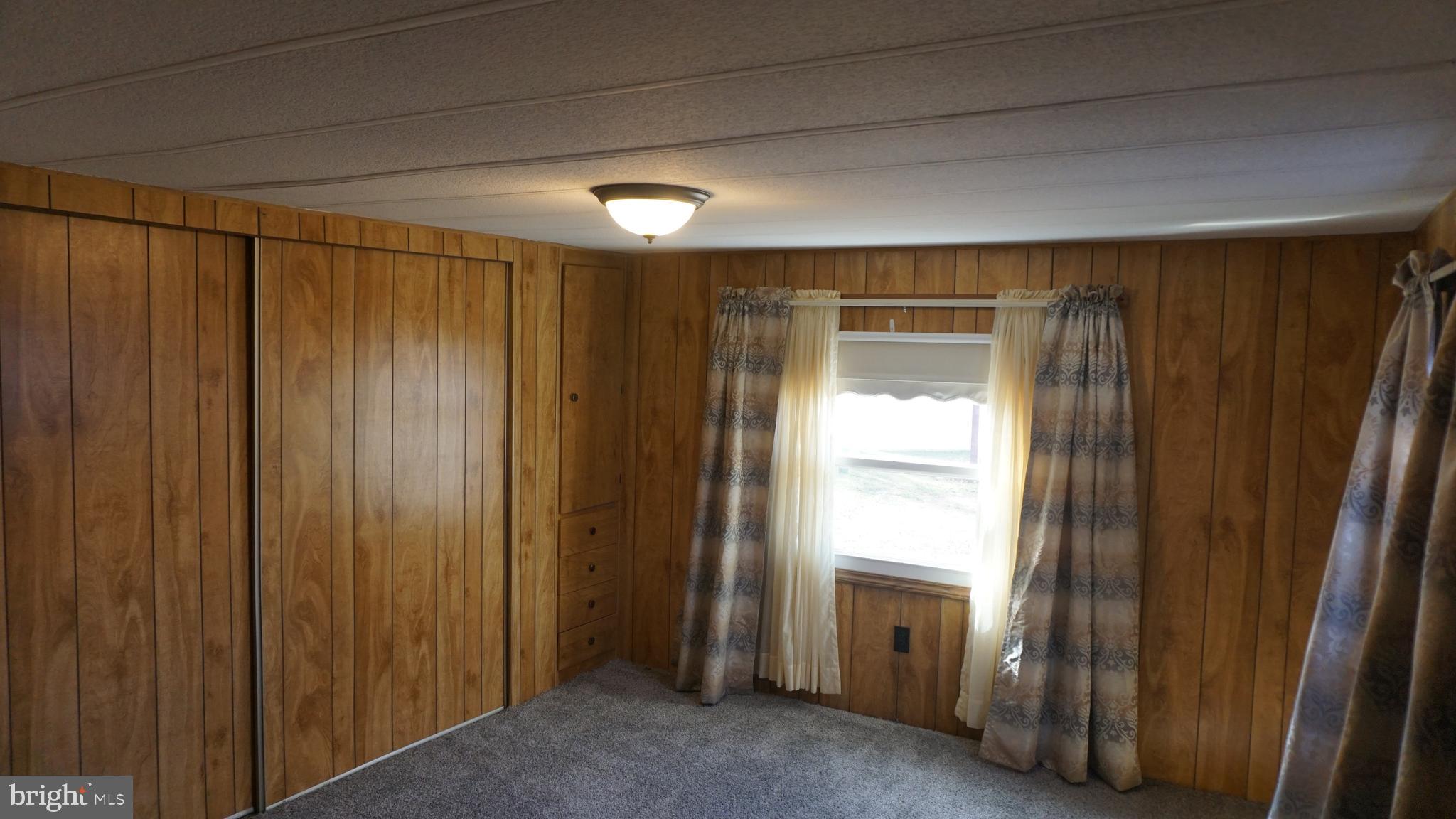 572 Miles Standish Lane Buena, NJ 08310 - Photo 13 of 22 a view of an empty room and a window