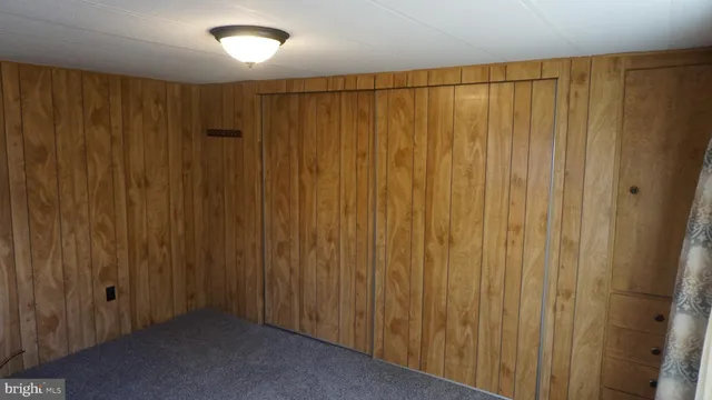 a bathroom with a shower and a window