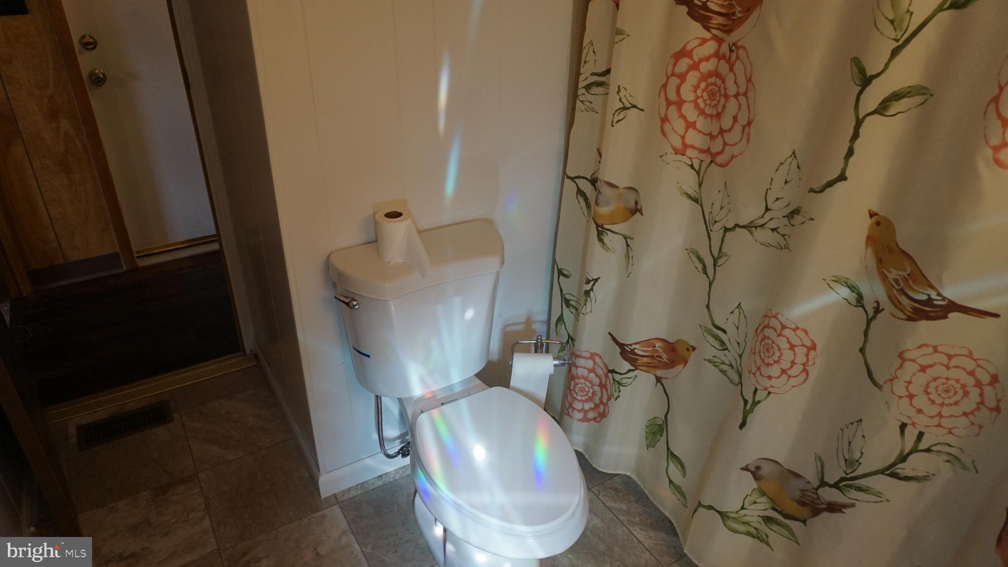 572 Miles Standish Lane Buena, NJ 08310 - Photo 20 of 22 a bathroom with a toilet and shower