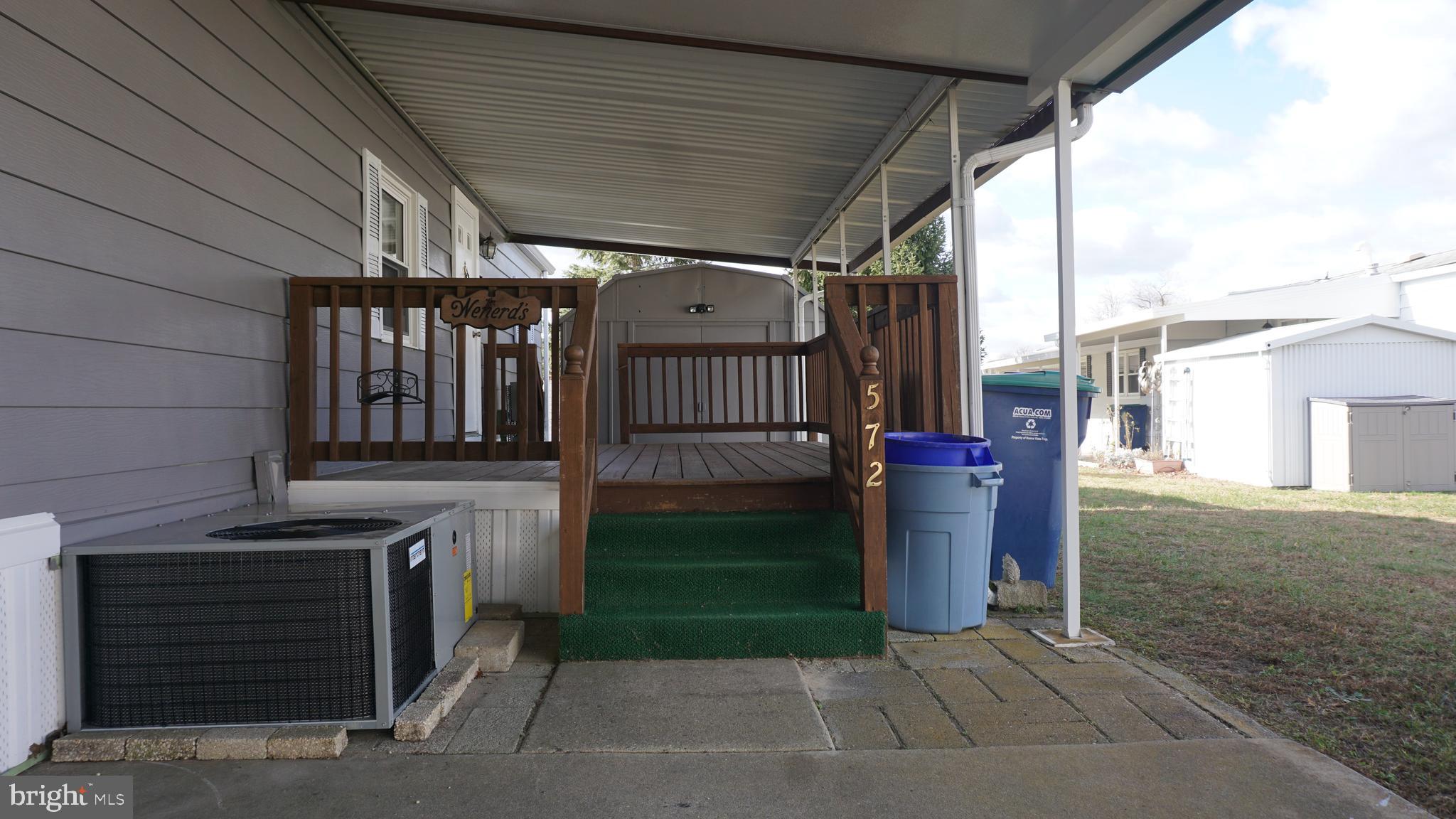 572 Miles Standish Lane Buena, NJ 08310 - Photo 5 of 22 a view of a porch with a door