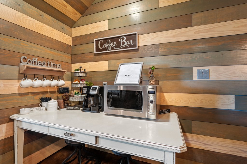 3259 Schumann Road Stonewall, TX 78671 - Photo 18 of 35 a kitchen with a stove and cabinets