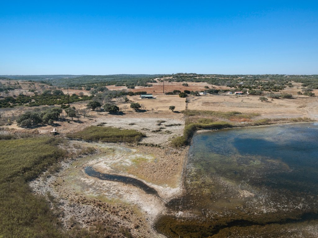 3259 Schumann Road Stonewall, TX 78671 - Photo 2 of 35 a view of beach and ocean