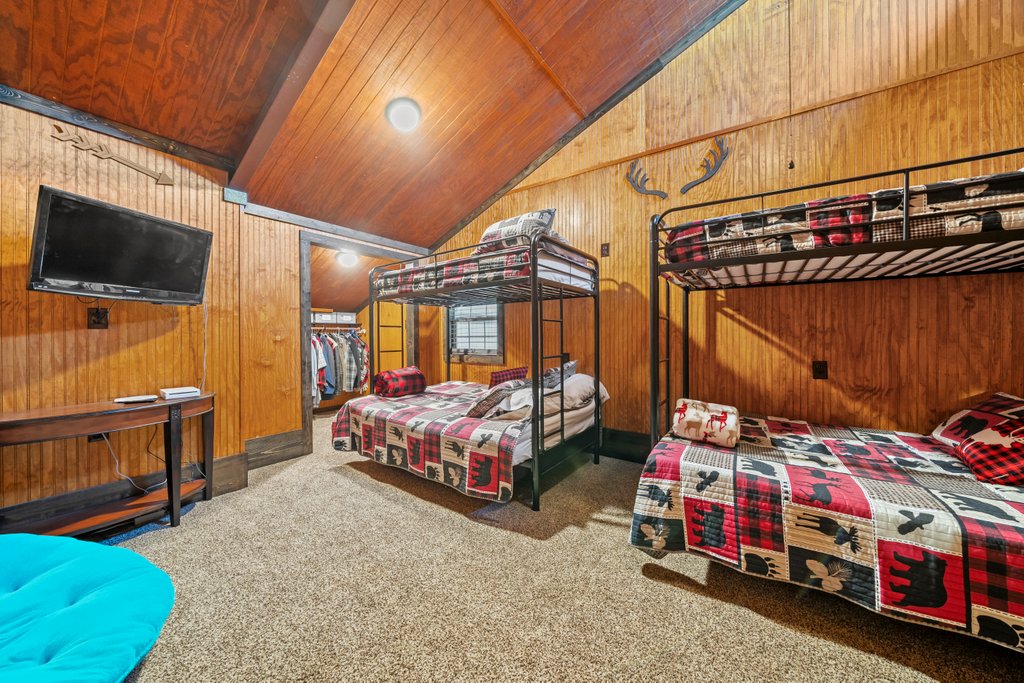 3259 Schumann Road Stonewall, TX 78671 - Photo 21 of 35 a bedroom with bed and a window