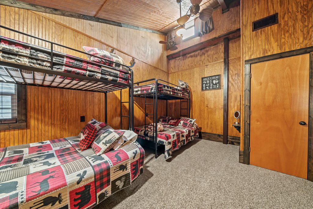 3259 Schumann Road Stonewall, TX 78671 - Photo 22 of 35 a bedroom with bed and a window