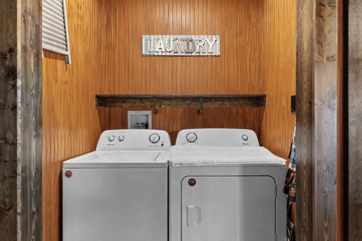 3259 Schumann Road Stonewall, TX 78671 - Photo 27 of 35 a utility room with dryer and washer