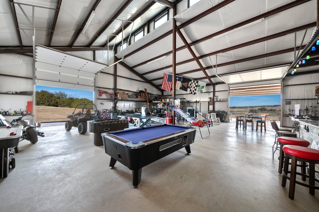 3259 Schumann Road Stonewall, TX 78671 - Photo 30 of 35 a view of a studio with couch