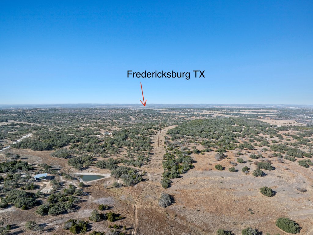 3259 Schumann Road Stonewall, TX 78671 - Photo 34 of 35 a view of a field with an ocean
