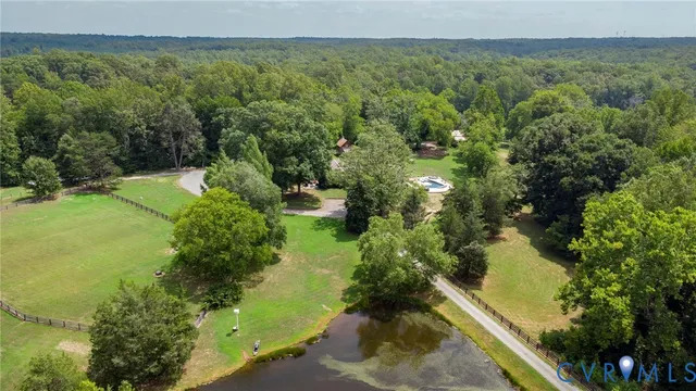 a view of a lake with a yard