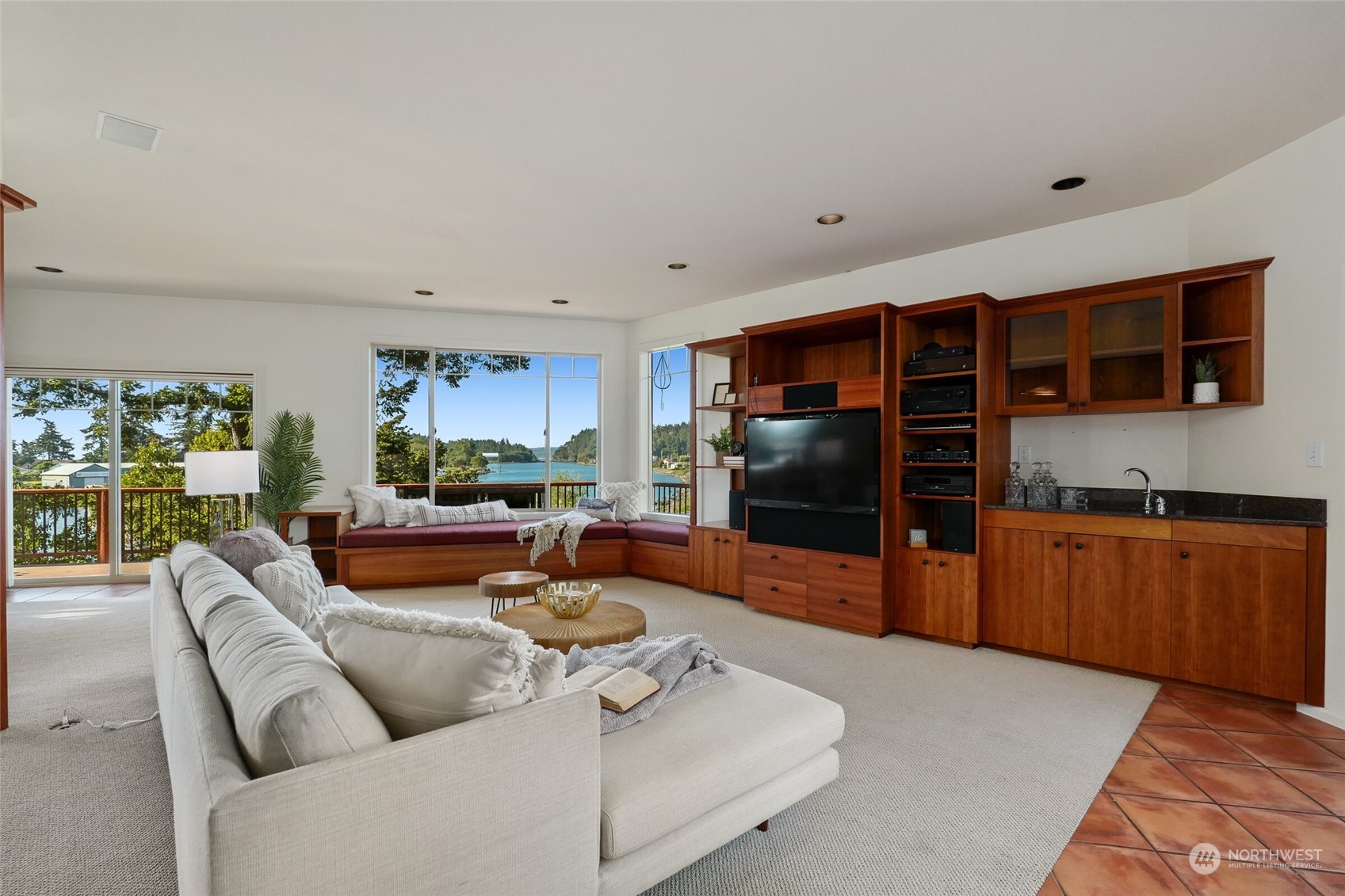 97 Samish Place La Conner, WA 98257 - Photo 12 of 40 a living room with furniture and a flat screen tv