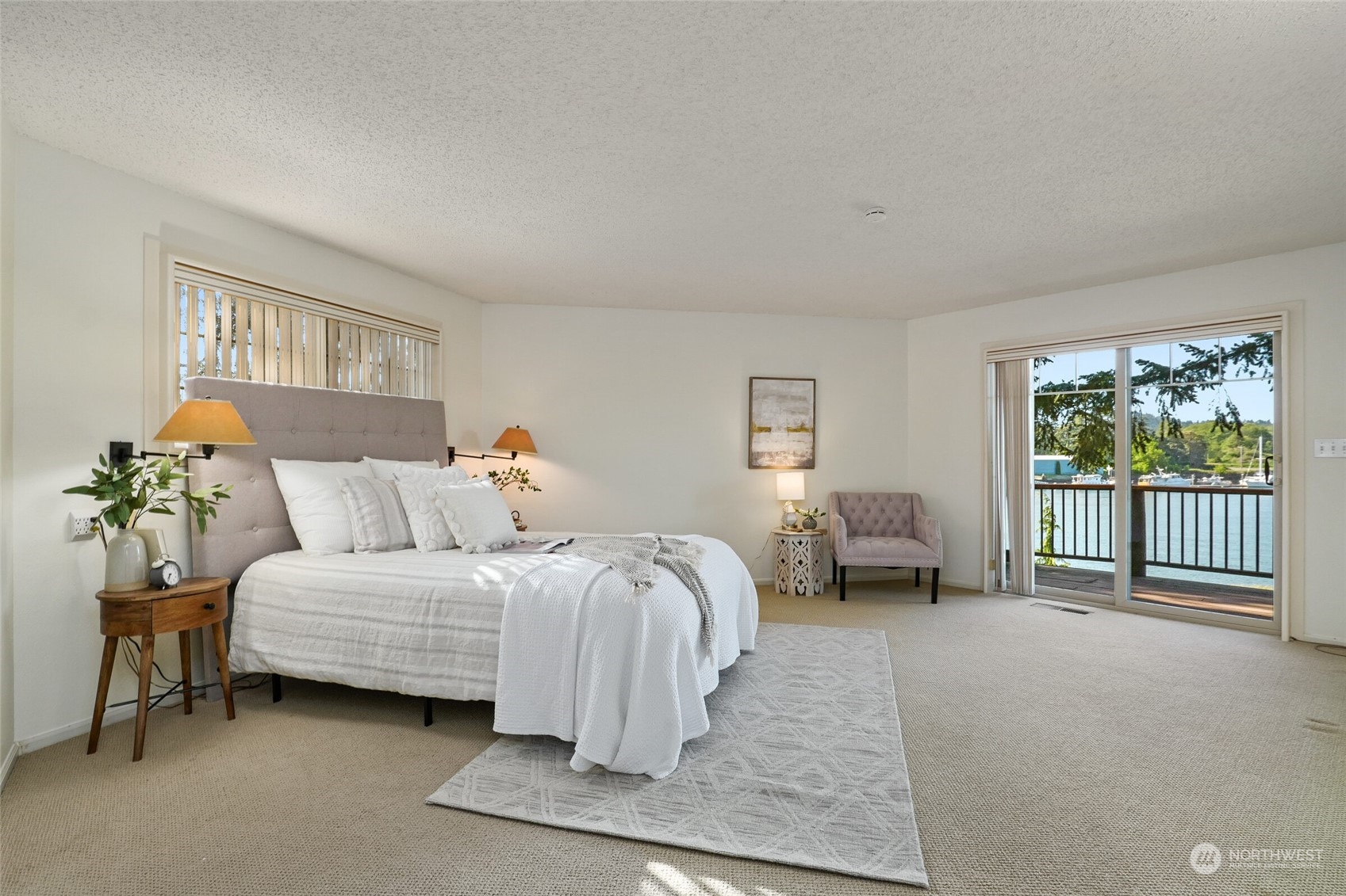 97 Samish Place La Conner, WA 98257 - Photo 21 of 40 a bedroom with a bed and a couch