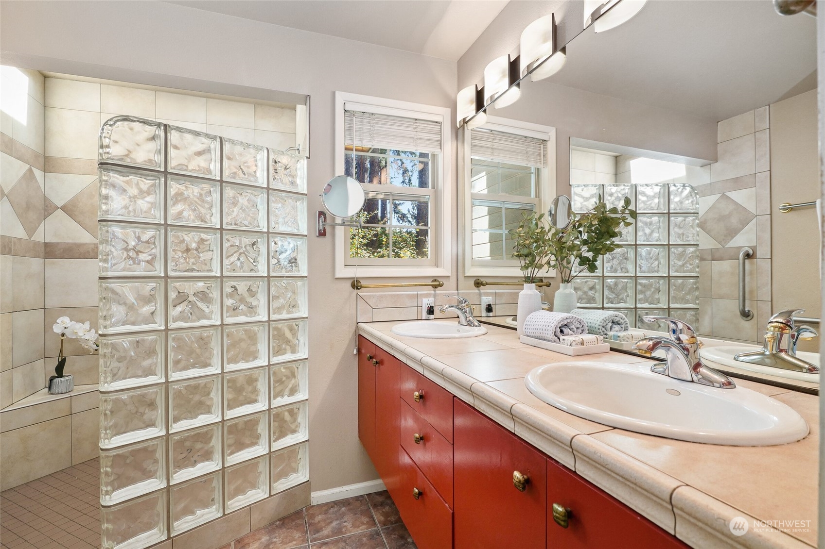 97 Samish Place La Conner, WA 98257 - Photo 22 of 40 a bathroom with a double vanity sink and a mirror