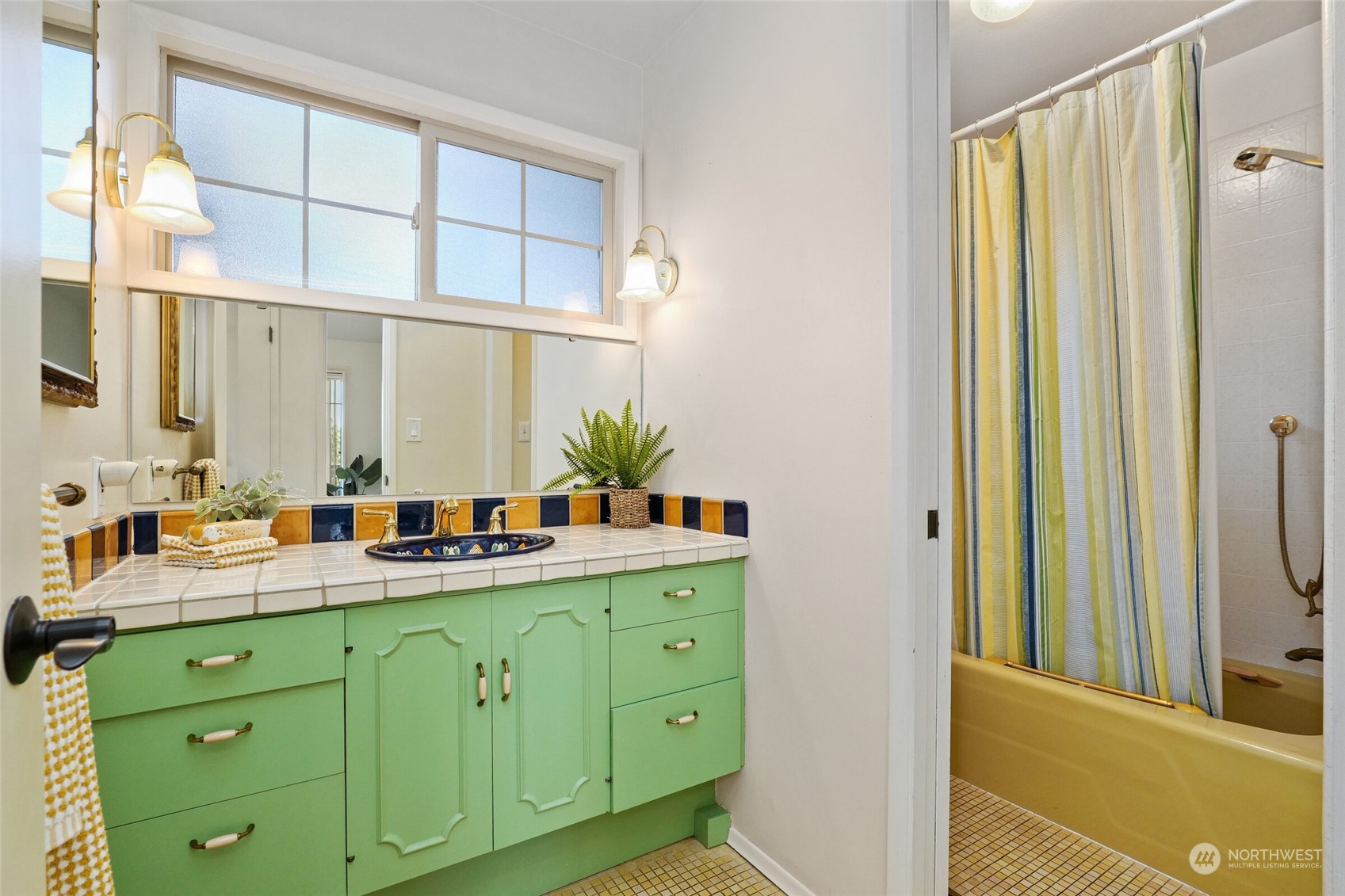 97 Samish Place La Conner, WA 98257 - Photo 24 of 40 a bathroom with a double vanity sink and a mirror