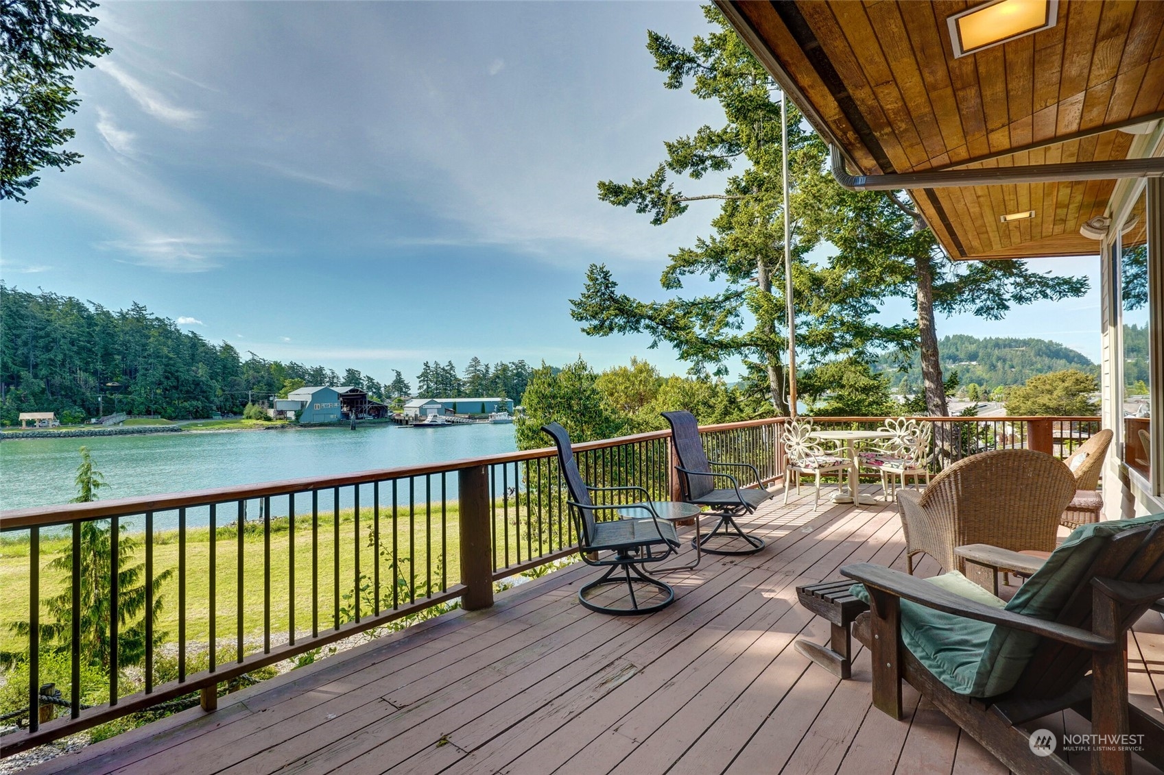 97 Samish Place La Conner, WA 98257 - Photo 34 of 40 a view of balcony with couch and wooden floor