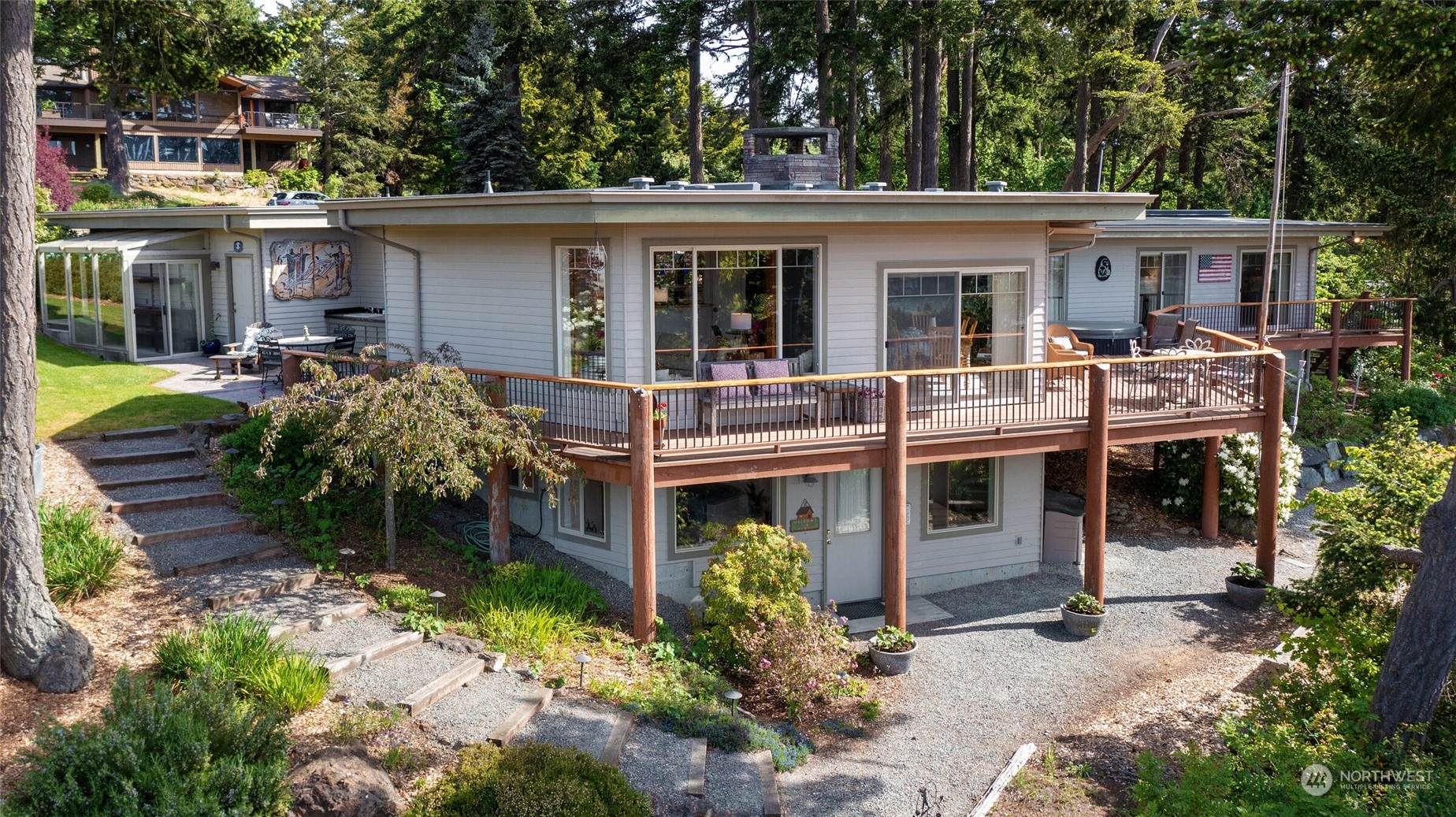 97 Samish Place La Conner, WA 98257 - Photo 4 of 40 front view of house with a yard and potted plants