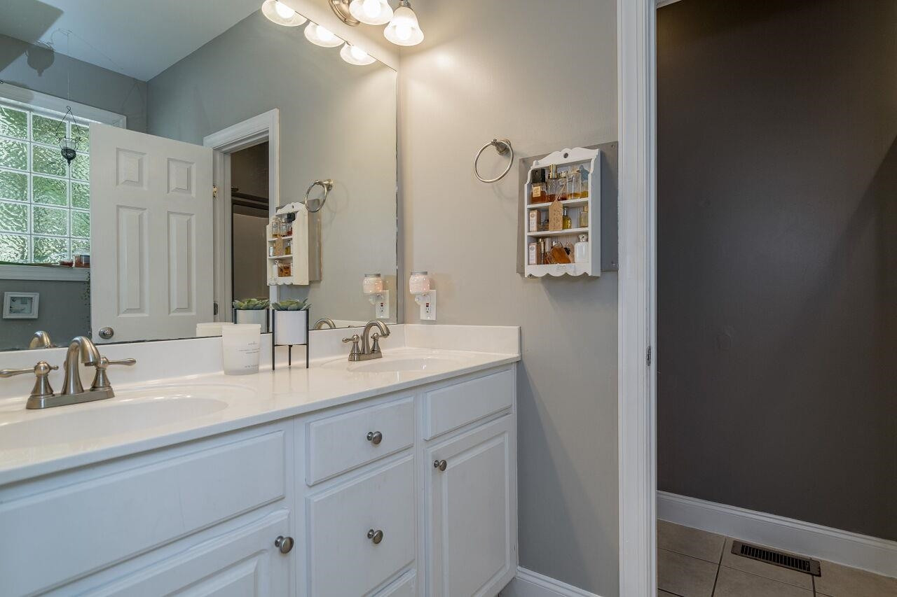 2152 Christian Light Road Fuquay-Varina, NC 27526 - Photo 12 of 30 The master suite has a dual vanity and walk-in closet. Master Suite