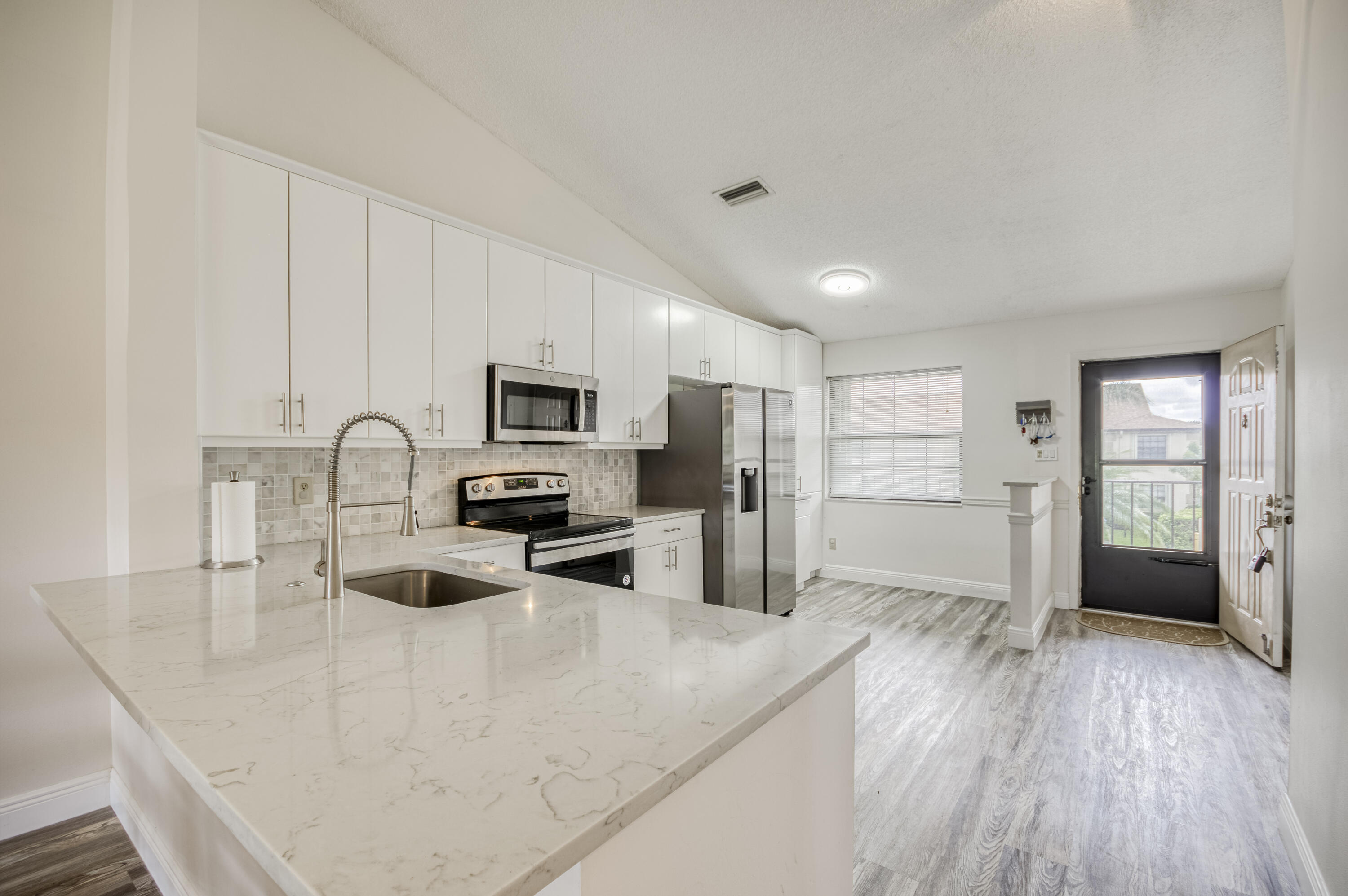 1102 Pinecrest Circle, Unit A Jupiter, FL 33458 - Photo 11 of 27 IMG-9