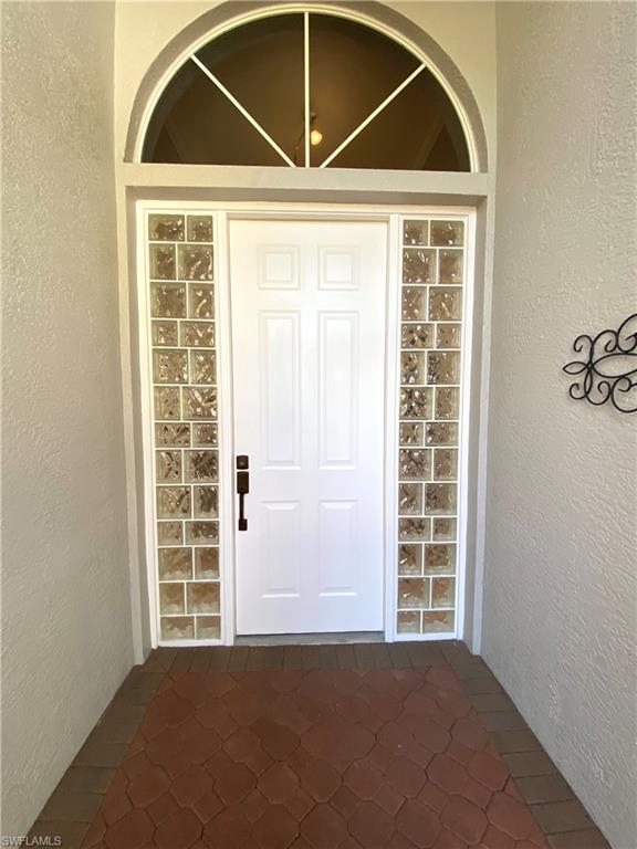 19307 Silver Oak Drive Estero, FL 33967 - Photo 20 of 43 a view of front door of a house