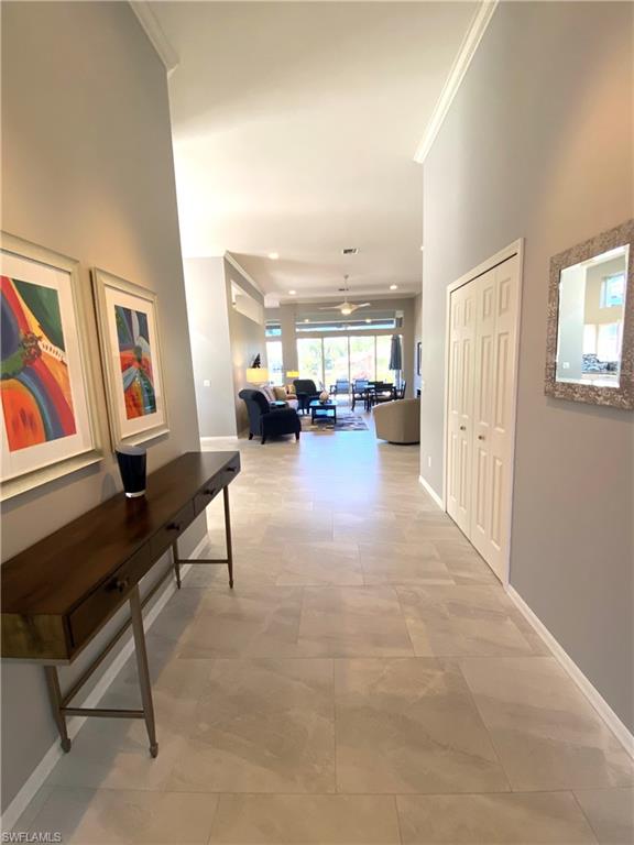 19307 Silver Oak Drive Estero, FL 33967 - Photo 23 of 43 a living room with furniture and a couch