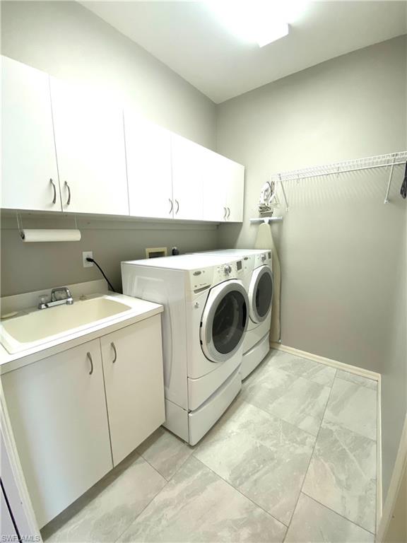 19307 Silver Oak Drive Estero, FL 33967 - Photo 30 of 43 a utility room with dryer and washer