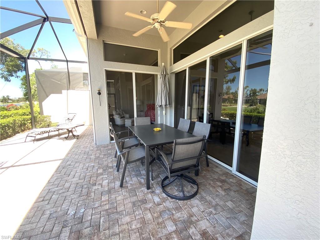 19307 Silver Oak Drive Estero, FL 33967 - Photo 31 of 43 a outdoor space with chairs