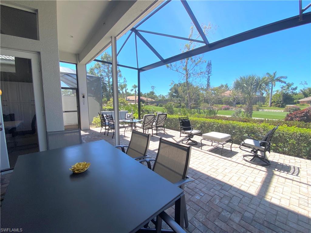 19307 Silver Oak Drive Estero, FL 33967 - Photo 32 of 43 a view of swimming pool with outdoor seating