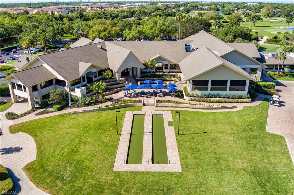 19307 Silver Oak Drive Estero, FL 33967 - Photo 35 of 43 a aerial view of a house with swimming pool and large trees