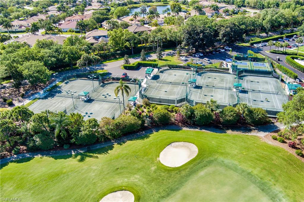 19307 Silver Oak Drive Estero, FL 33967 - Photo 36 of 43 a view of yard with swimming pool and outdoor seating