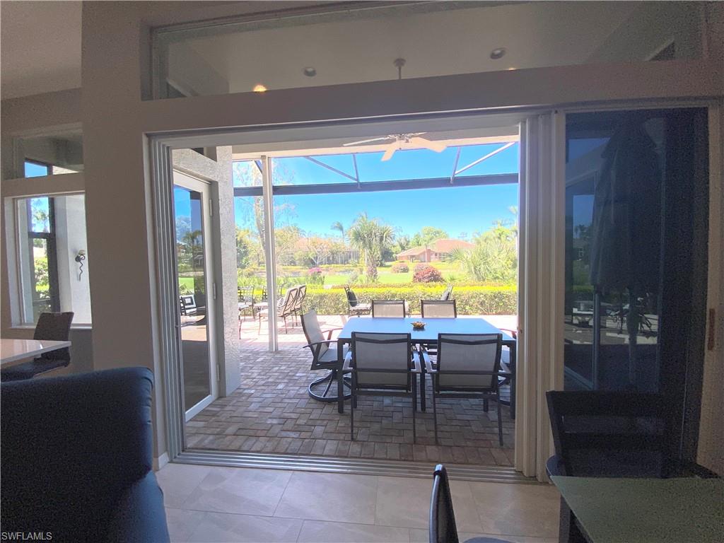 19307 Silver Oak Drive Estero, FL 33967 - Photo 4 of 43 a dining room with furniture window and outside view