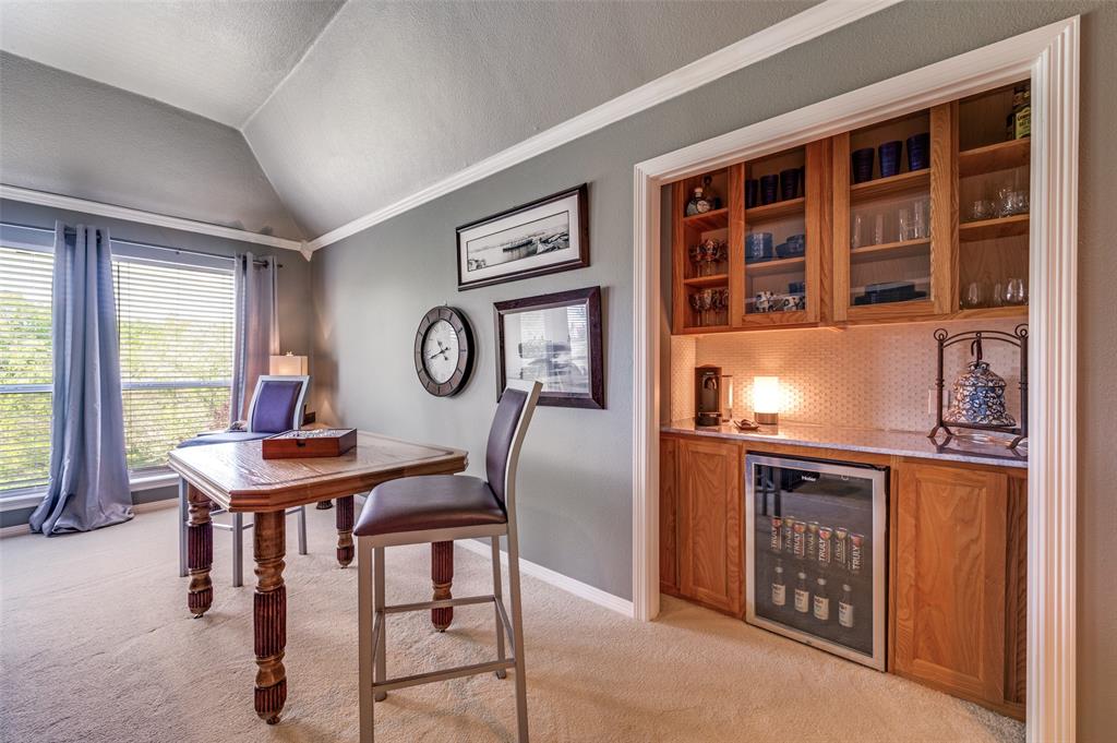 2841 Winding Creek Road Prosper, TX 75078 - Photo 25 of 40 a view of a workspace with furniture