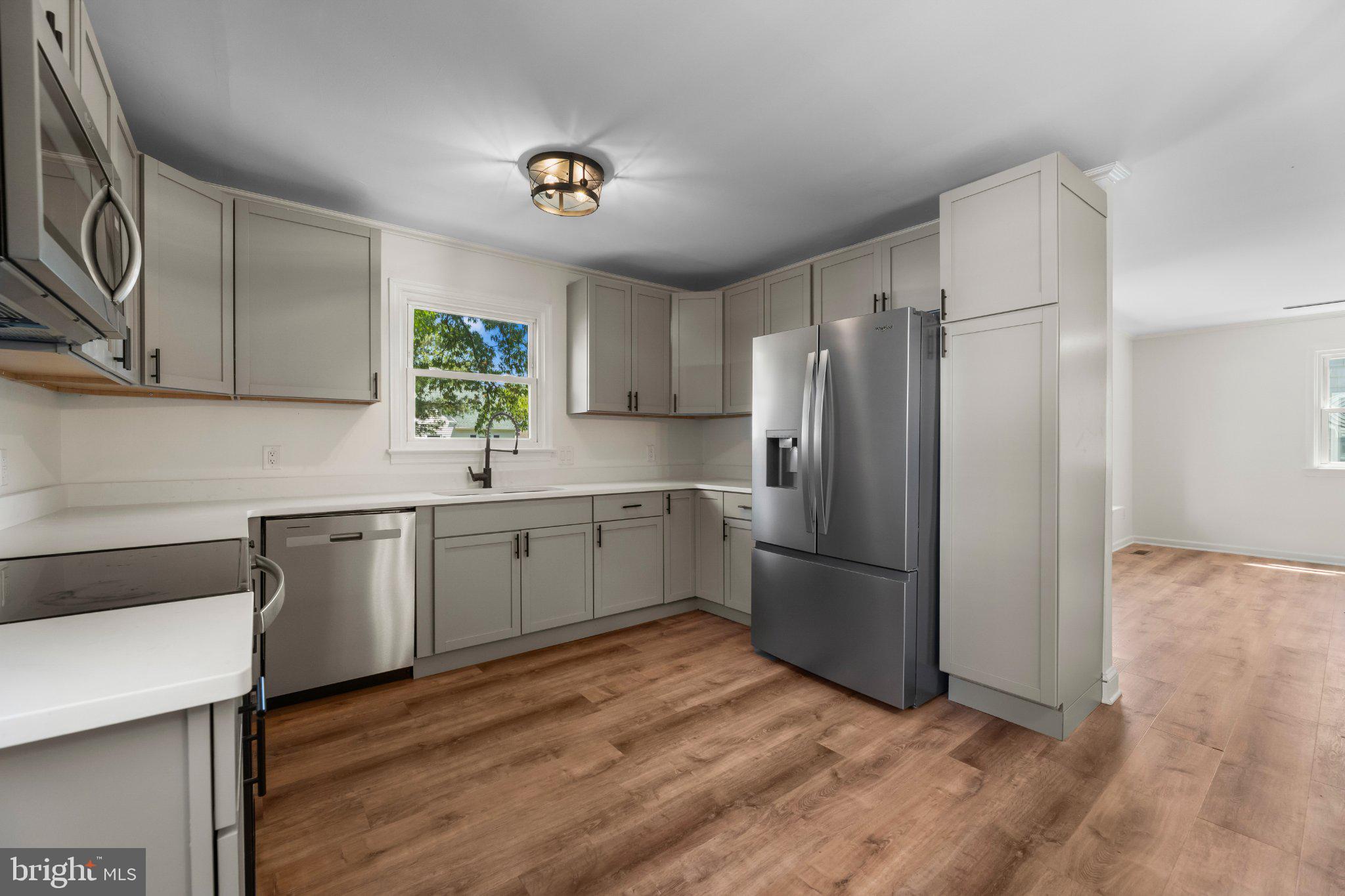 12 Oak Street Cambridge, MD 21613 - Photo 11 of 26 Modern kitchen with sleek finishes.