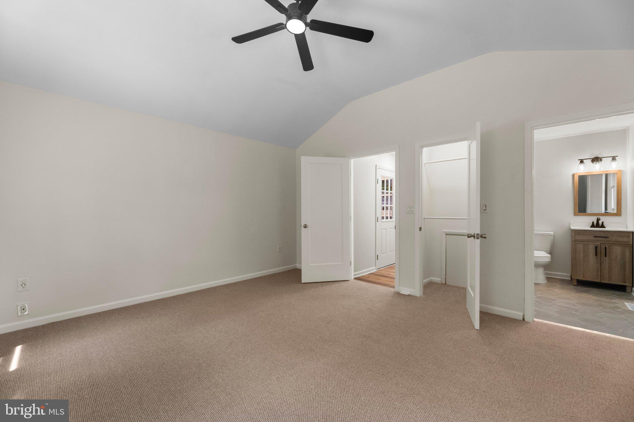 12 Oak Street Cambridge, MD 21613 - Photo 23 of 26 Spacious room with modern charm.