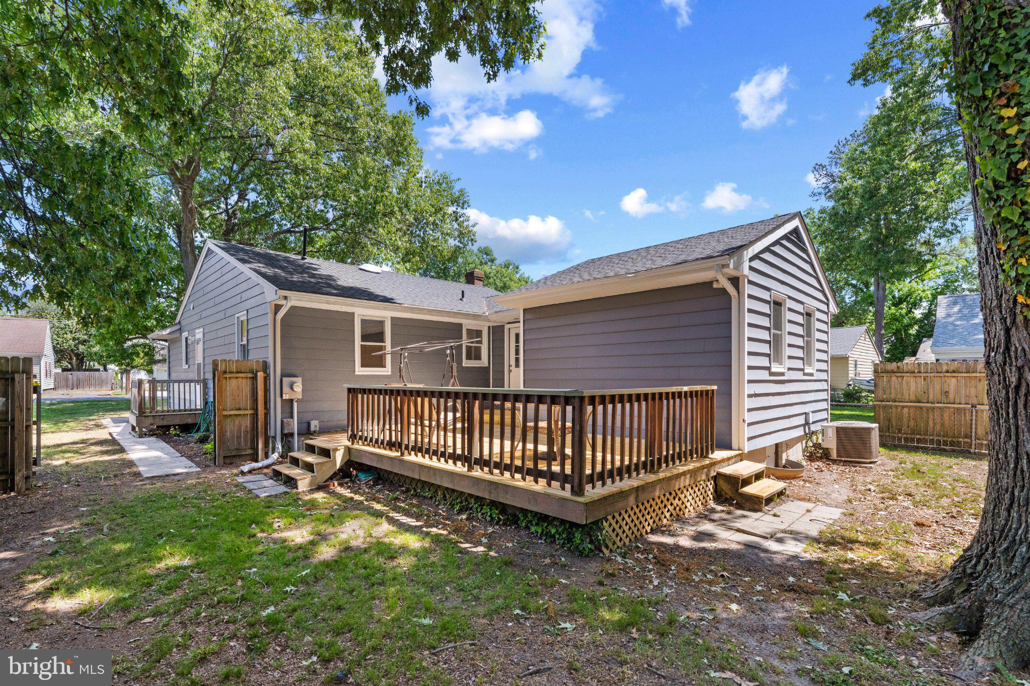 12 Oak Street Cambridge, MD 21613 - Photo 5 of 26 Charming backyard retreat with deck.