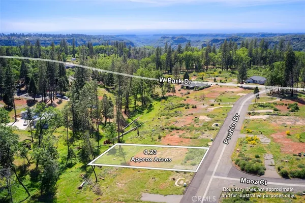 a view of a swimming pool with a patio and a yard