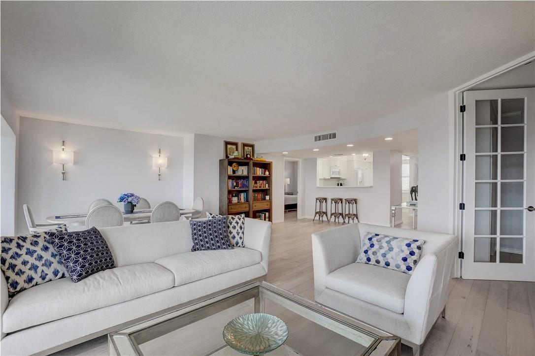 2871 North Ocean Boulevard, Unit C519 Boca Raton, FL 33431 - Photo 15 of 36 a living room with furniture and a couch