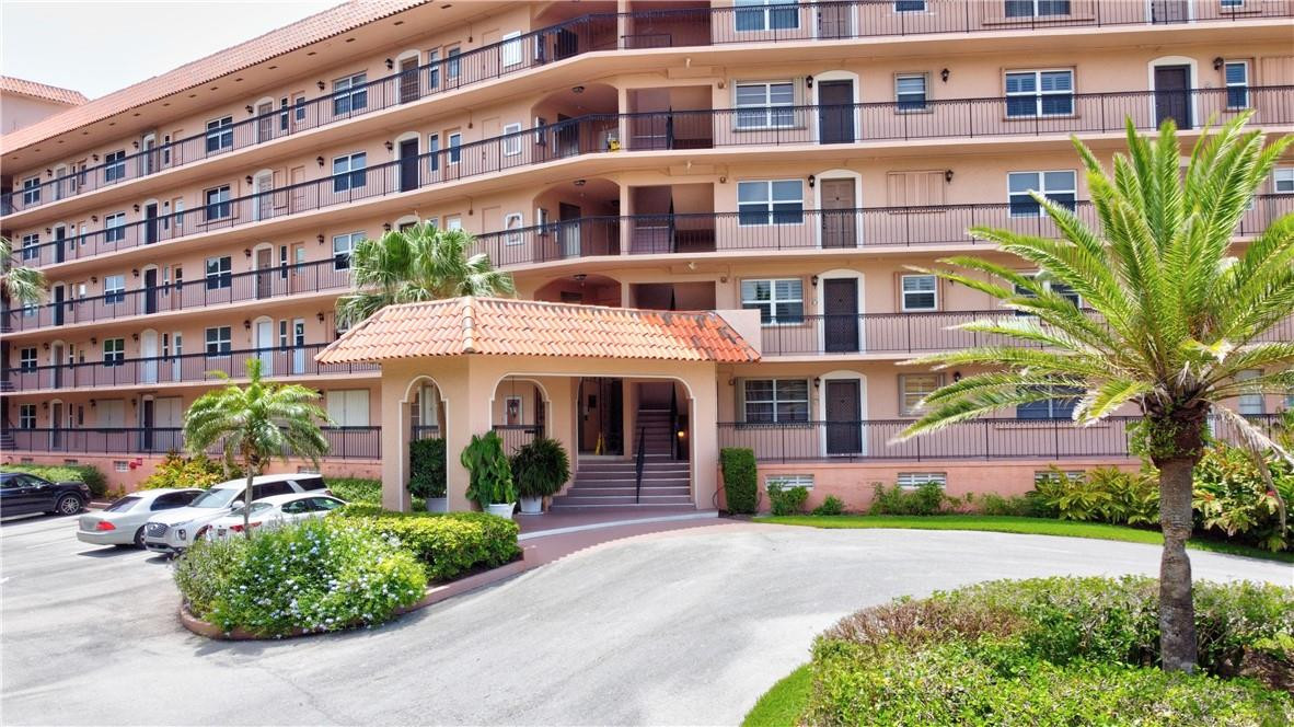 2871 North Ocean Boulevard, Unit C519 Boca Raton, FL 33431 - Photo 27 of 36 a front view of a building