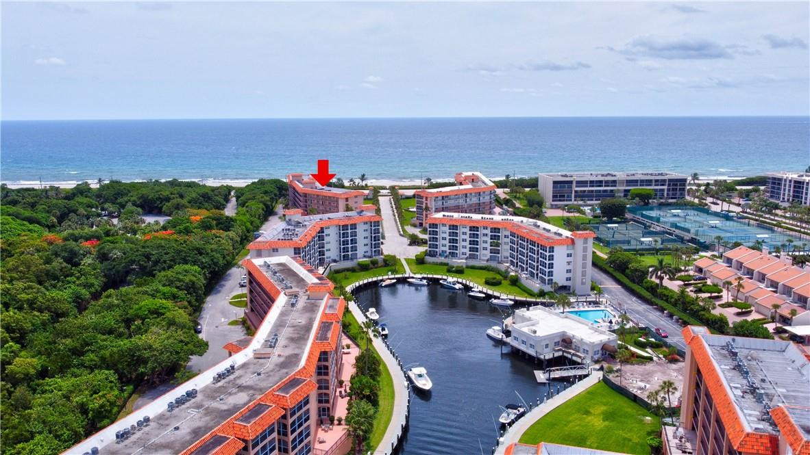 2871 North Ocean Boulevard, Unit C519 Boca Raton, FL 33431 - Photo 31 of 36 an aerial view of a house with yard swimming pool and outdoor seating