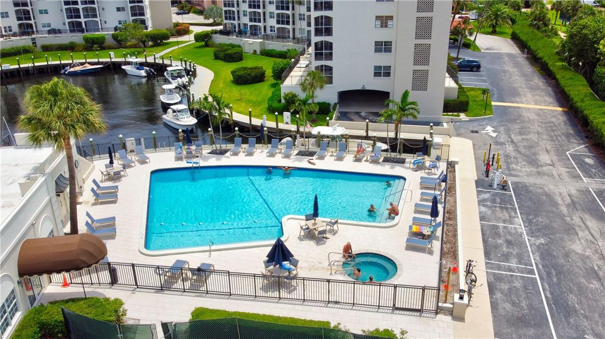 2871 North Ocean Boulevard, Unit C519 Boca Raton, FL 33431 - Photo 32 of 36 a front view of building with outdoor space and seating area