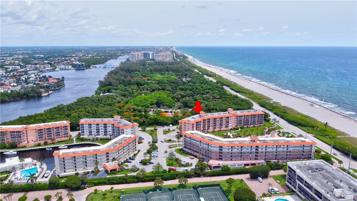2871 North Ocean Boulevard, Unit C519 Boca Raton, FL 33431 - Photo 34 of 36 an aerial view of multiple house