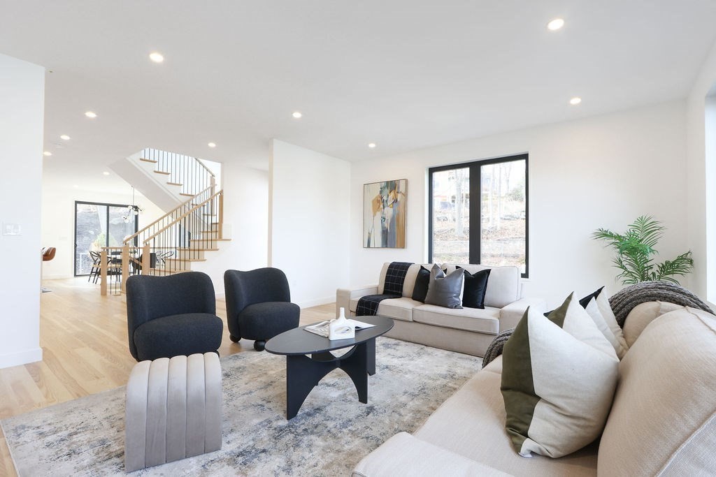 41 Nathan Road, Unit 1 Waltham, MA 02453 - Photo 12 of 25 a living room with furniture and a large window