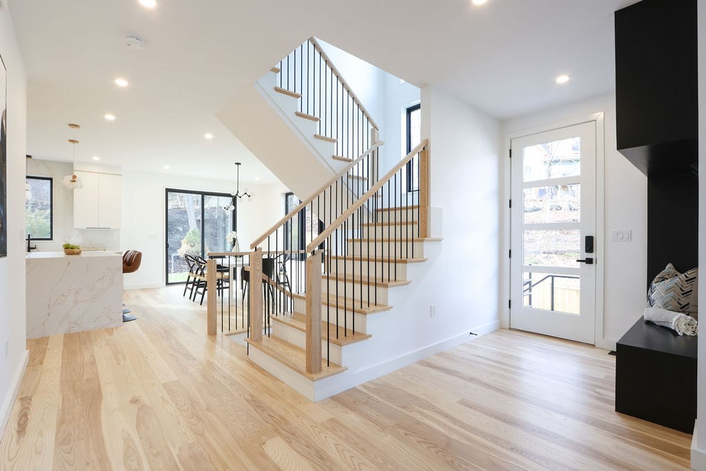 41 Nathan Road, Unit 1 Waltham, MA 02453 - Photo 13 of 25 a view of entryway and livingroom with wooden floor
