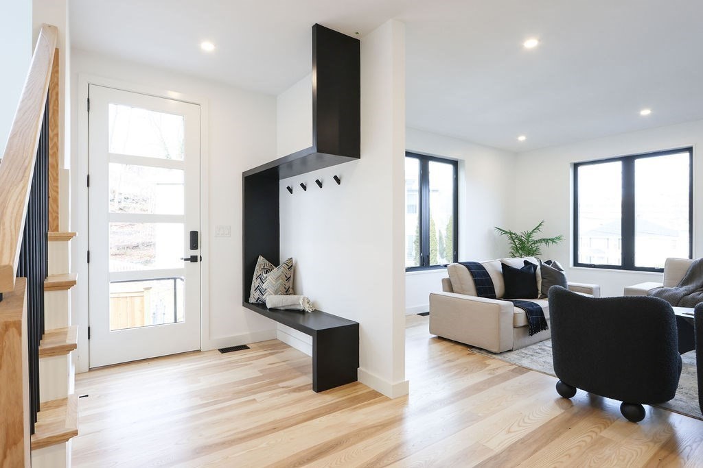 41 Nathan Road, Unit 1 Waltham, MA 02453 - Photo 14 of 25 a living room with furniture window and wooden floor