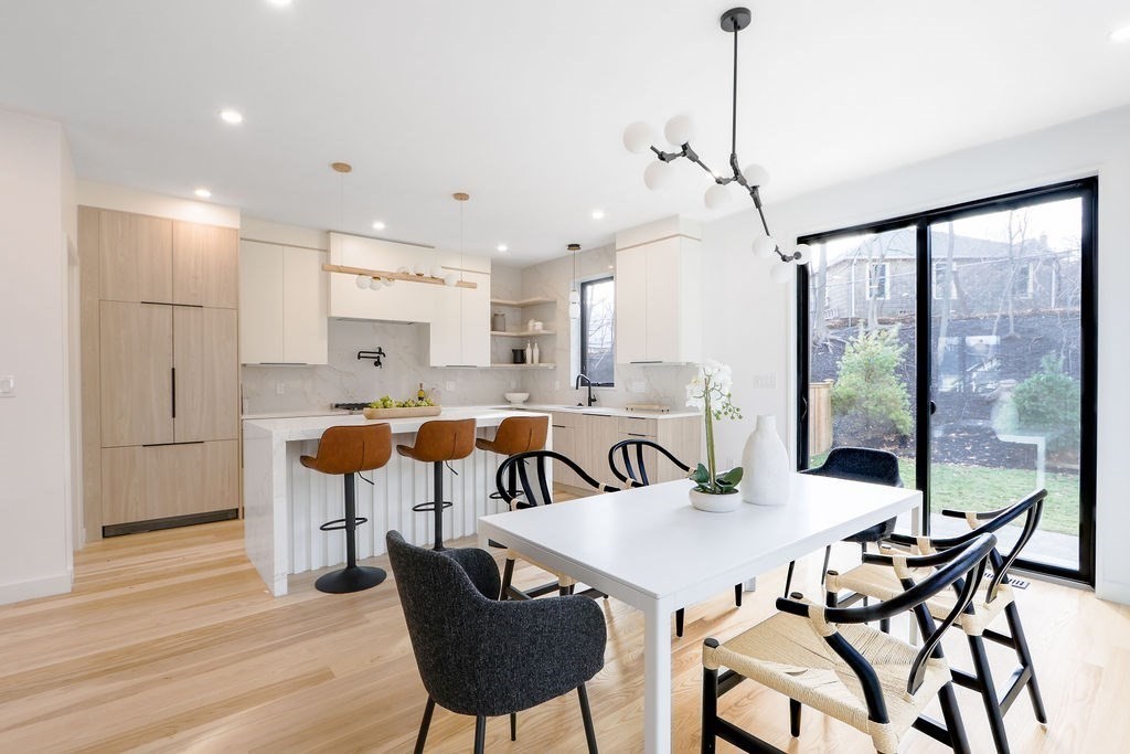 41 Nathan Road, Unit 1 Waltham, MA 02453 - Photo 7 of 25 a view of a dining room with furniture window and wooden floor